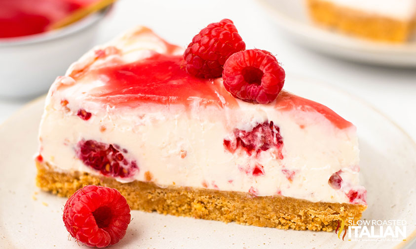 slice of raspberry cheesecake on a plate