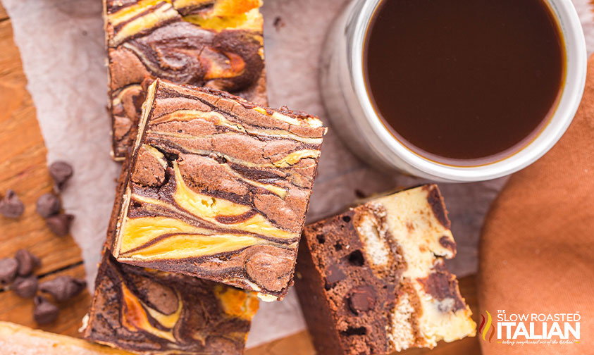 top view of tiramisu brownies with a cup of coffee