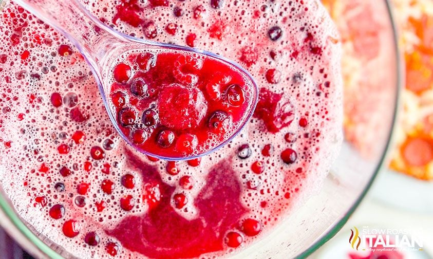 ladle of cranberry raspberry punch