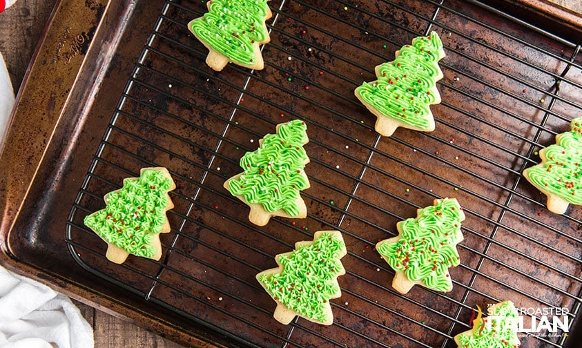 decorated tree cookies on wire rack