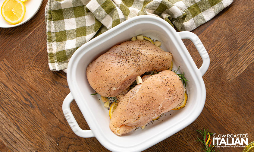 seasoned chicken breasts in baking dish