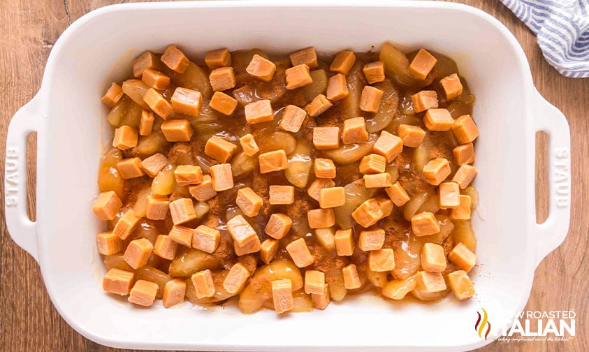 caramels in a baking dish with apple pie filling