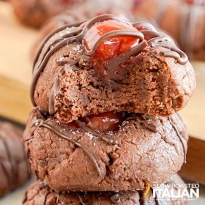 closeup of chocolate cherry thumbprint cookies