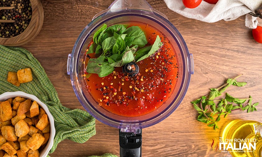 blending basil, crushed tomatoes and shallots in a food processor