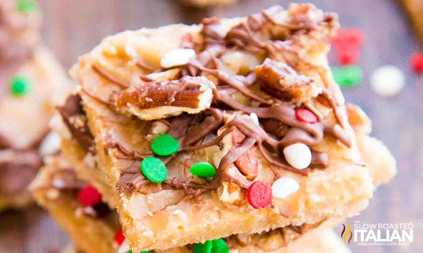 closeup of stacked salted caramel pecan toffee bars