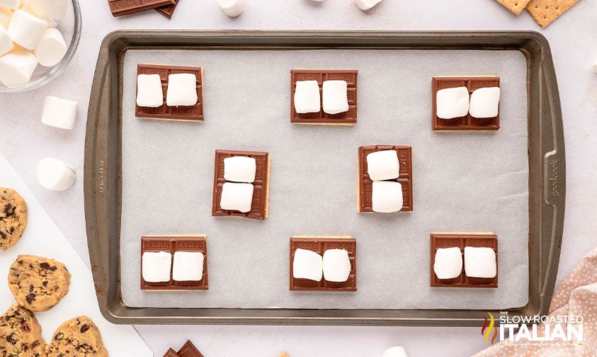 marshmallows on top of chocolate bar and graham crackers