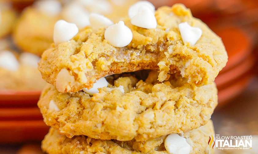 stacked soft pumpkin cookies with white chocolate