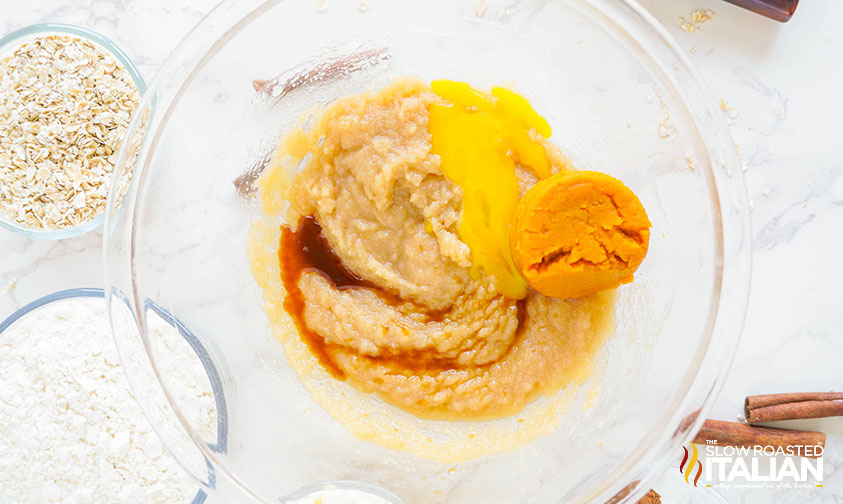 mixing wet ingredients for pumpkin oatmeal cookies