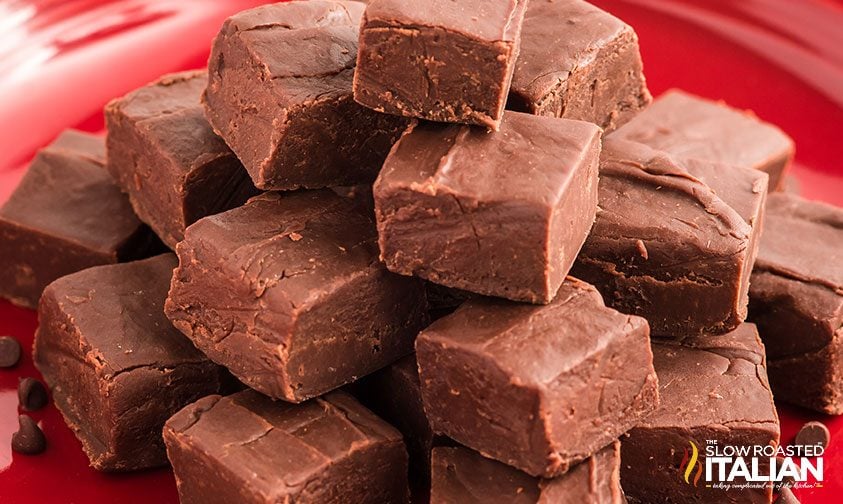 stacked squares of condensed milk chocolate fudge