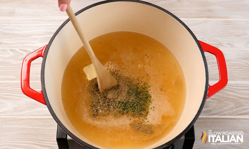 making broth for chicken and dumplings