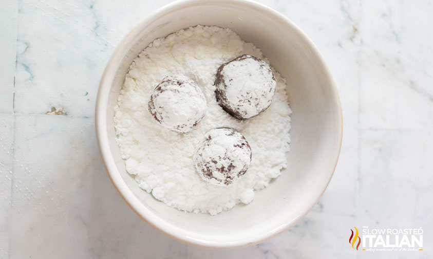 boozy rum balls rolled in powdered sugar