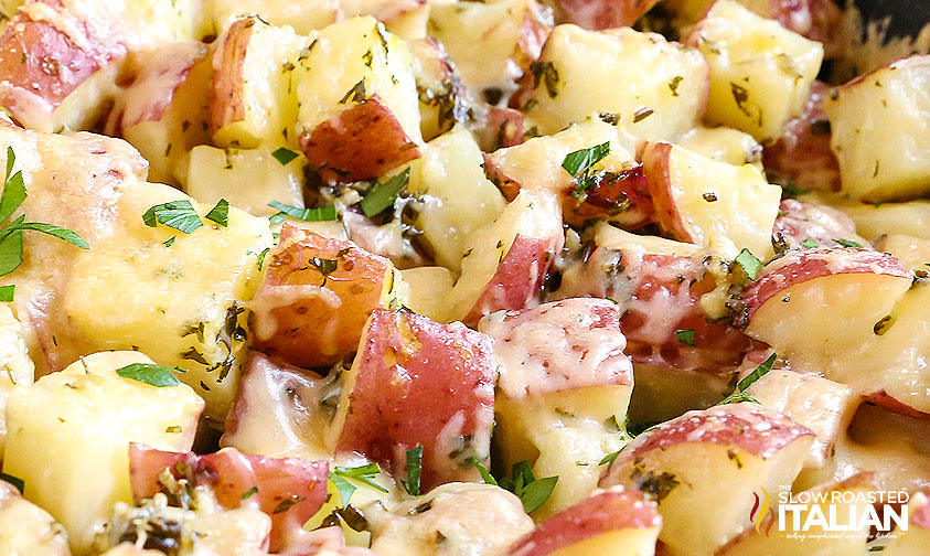 closeup of cheesy garlic parmesan skillet potatoes