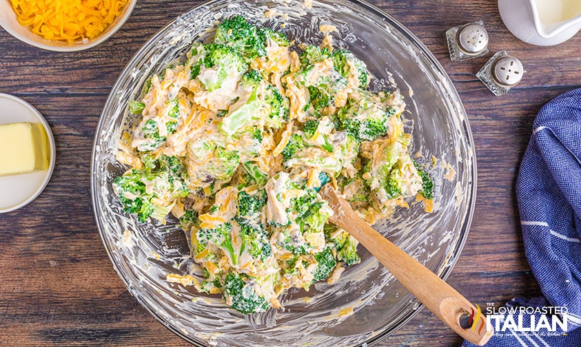 mixing broccoli into mixture