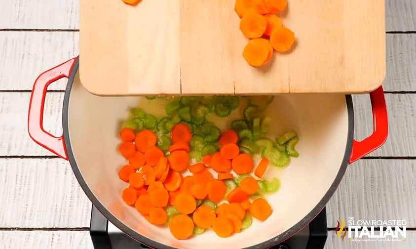 chopped celery and carrots in a large pot