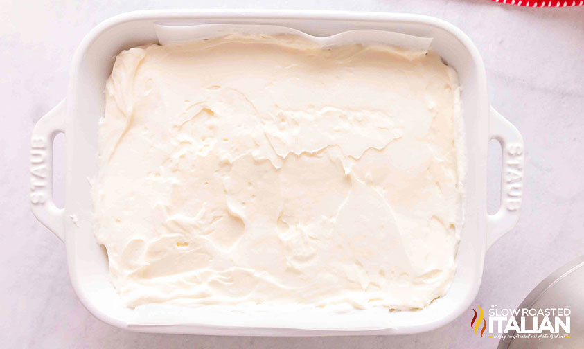 cheesecake layer of pecan pie dip in baking dish