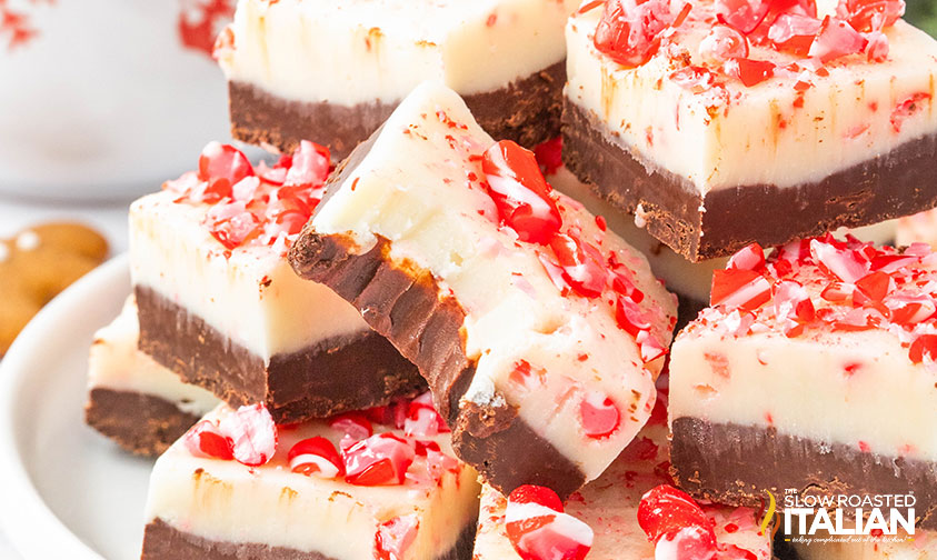 stacked peppermint bark fudge on a plate