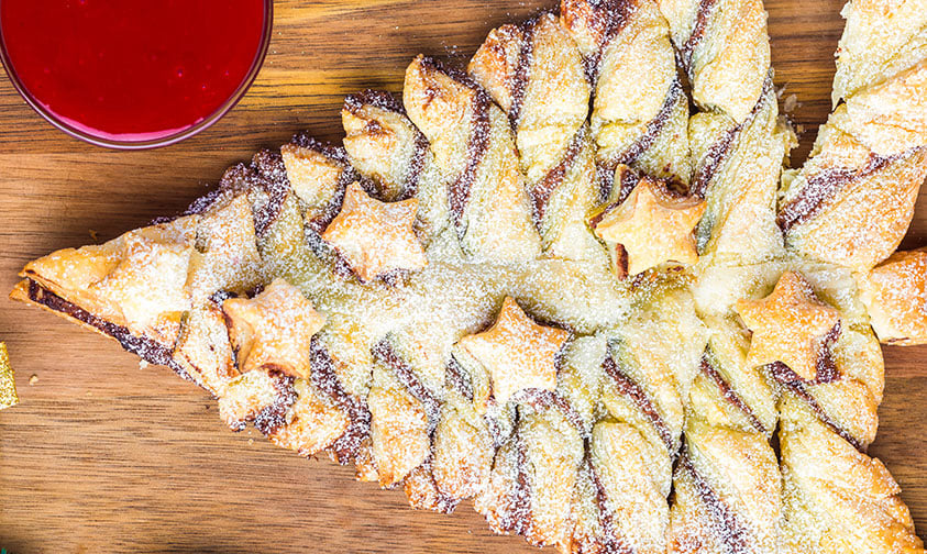 baked nutella christmas tree on a wooden board