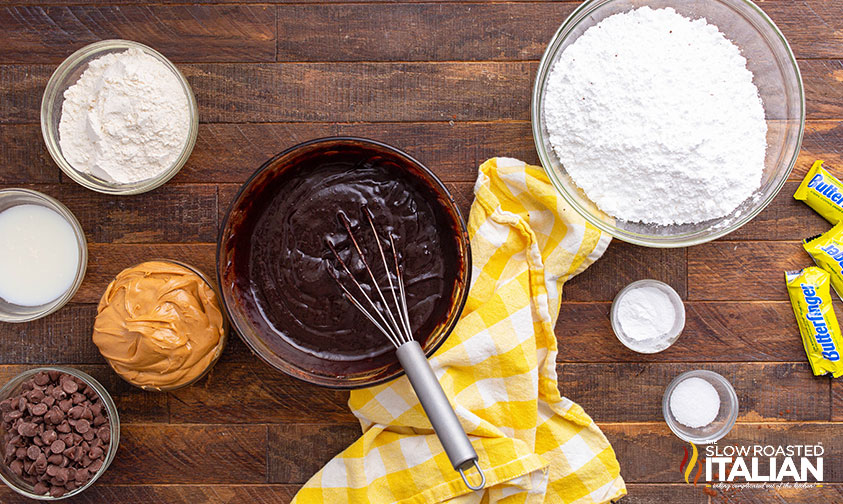 mixing brownie butterfinger batter