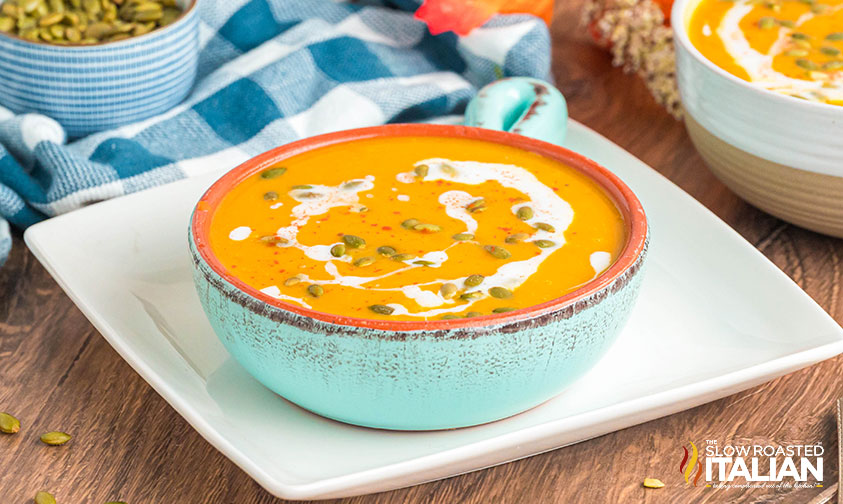 panera autumn squash soup in a blue bowl