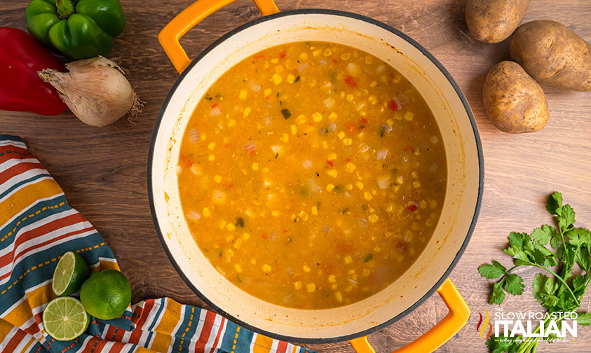 chicken stock, potatoes and corn added to large pot