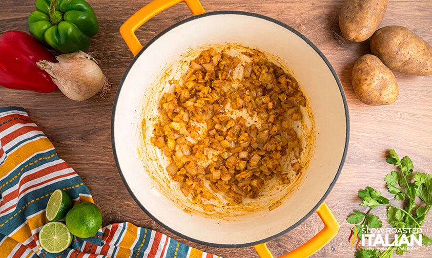 sauteed onions and seasoning in a pot