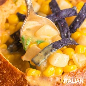 closeup of panera mexican street corn chowder on a spoon