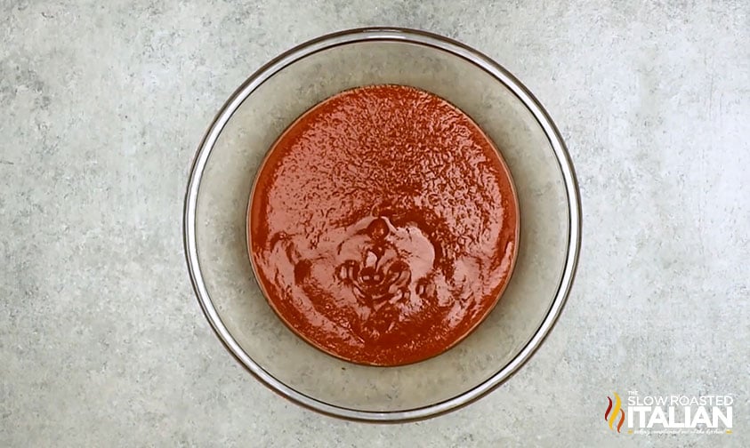 sauce for porcupine meatballs in a glass mixing bowl