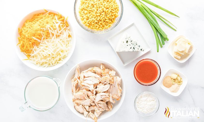 overhead: measured ingredients for mac and cheese with buffalo chicken