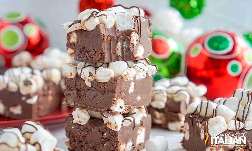 stacked squares of cocoa fudge with marshmallows