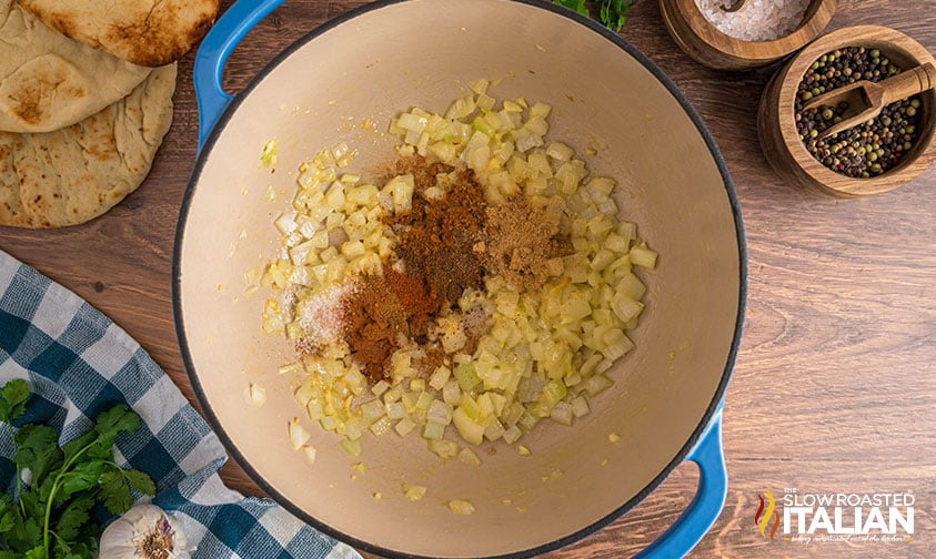 sauteed onions, garlic and spices in a pot