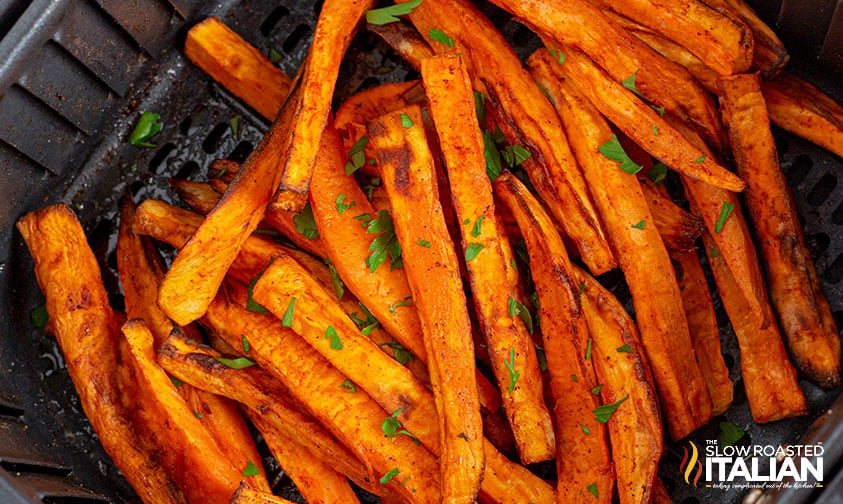 crispy sweet potato fries with fresh parsley in air fryer