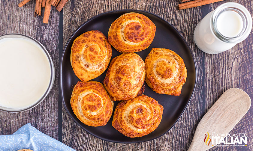 air fried cinnamon rolls on round black plate