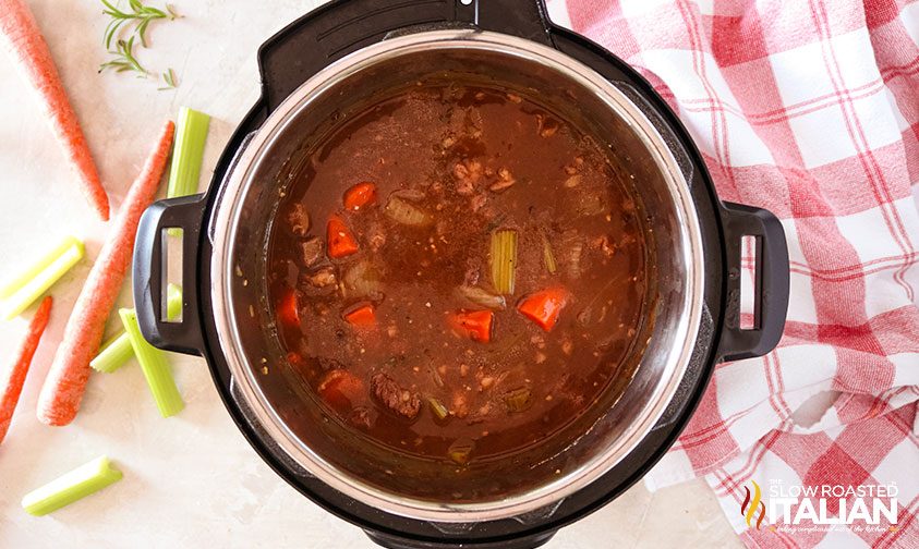 hearty beef stew in pressure cooker