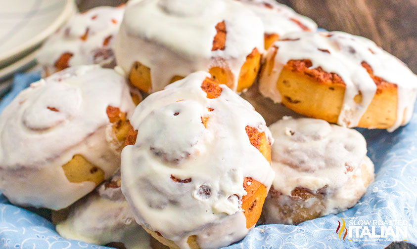 pile of frosting covered canned cinnamon rolls