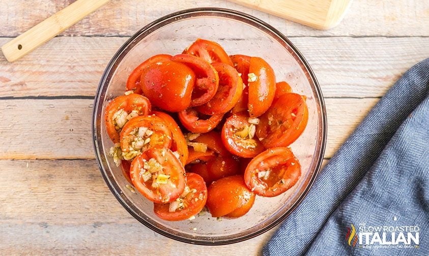roma tomato halves tossed with onion, garlic, oil, and spices