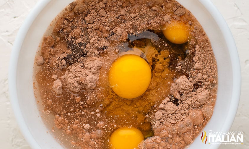 cake mix, eggs and oil in mixing bowl