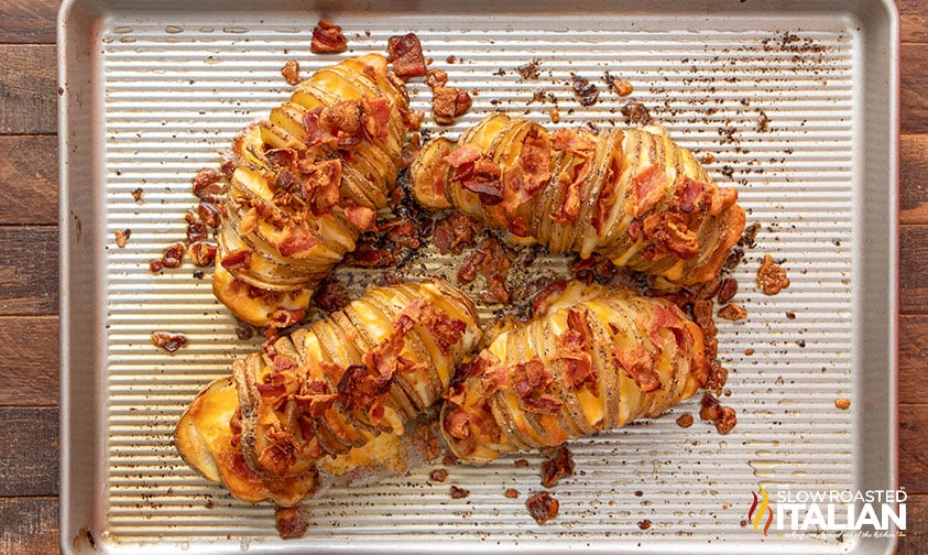 top view of hasselback potatoes with crispy bacon and cheddar