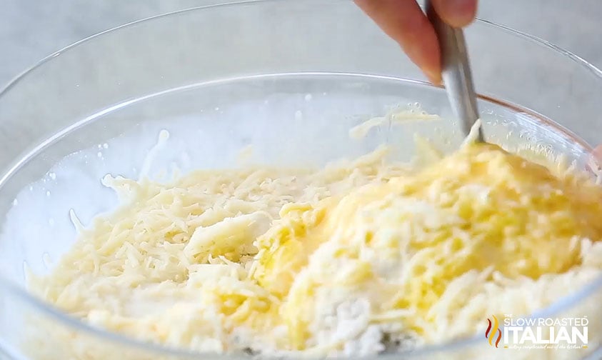 mixing batter for pepperoni pizza bites