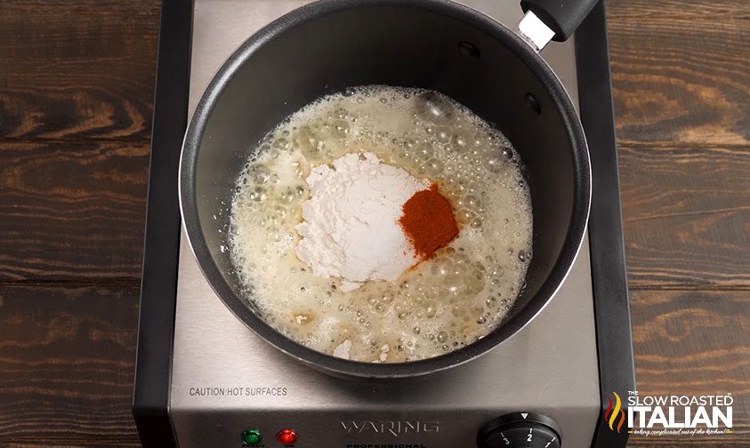 flour and cayenne with melted butter in saucepan