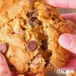 hand pulling apart an air fryer chocolate chip cookie