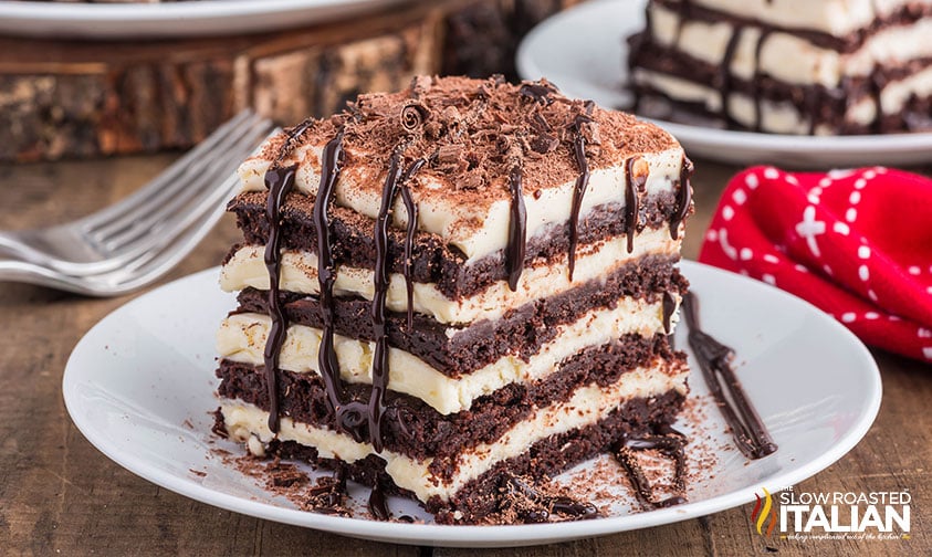 slice of chocolate brownie lasagna on a white plate