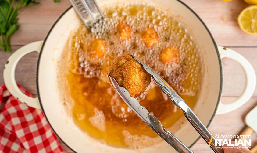 fried crab balls in a pot