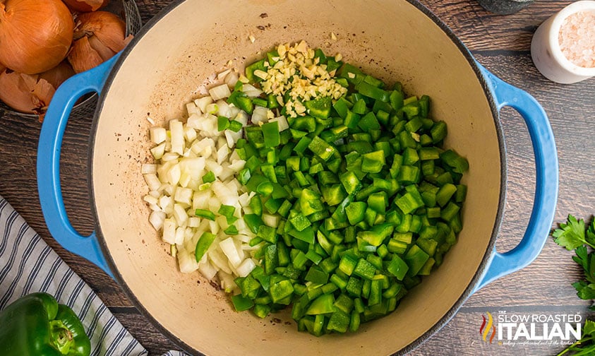 onions, green pepper and garlic in a pot