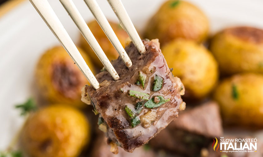 garlic butter steak bite on a fork