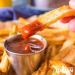 homemade air fryer french fries dipped in ketchup