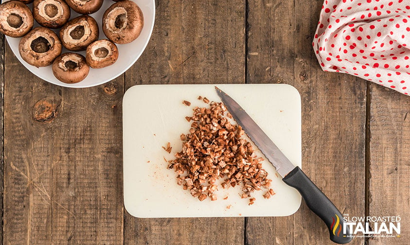 chopped mushrooms on a cutting board