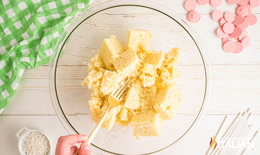 crumbling baked cake with a fork