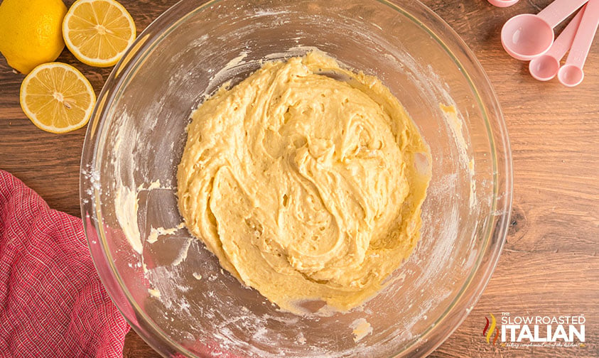 lemon loaf batter in glass mixing bowl