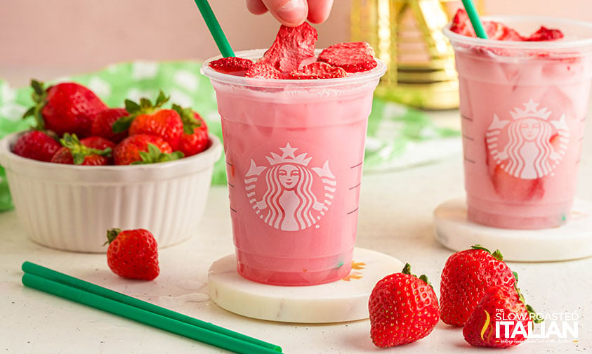 adding freeze dried strawberries to pink drink
