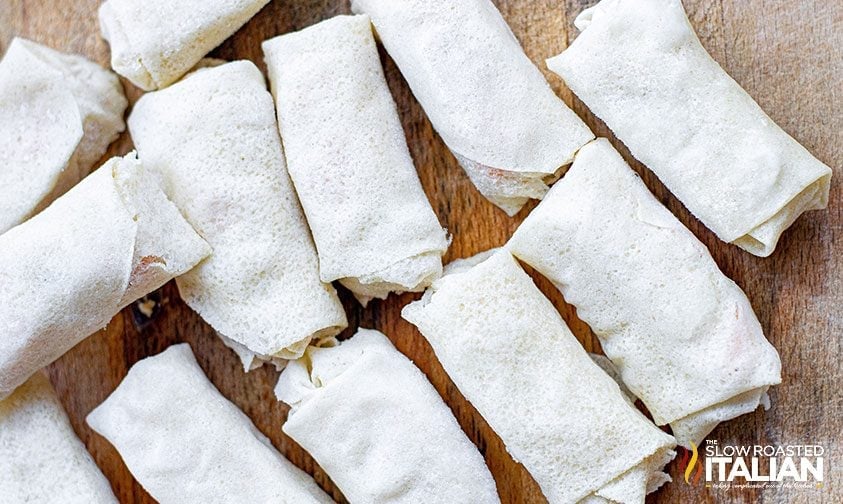 assembled chicken spring rolls before being fried